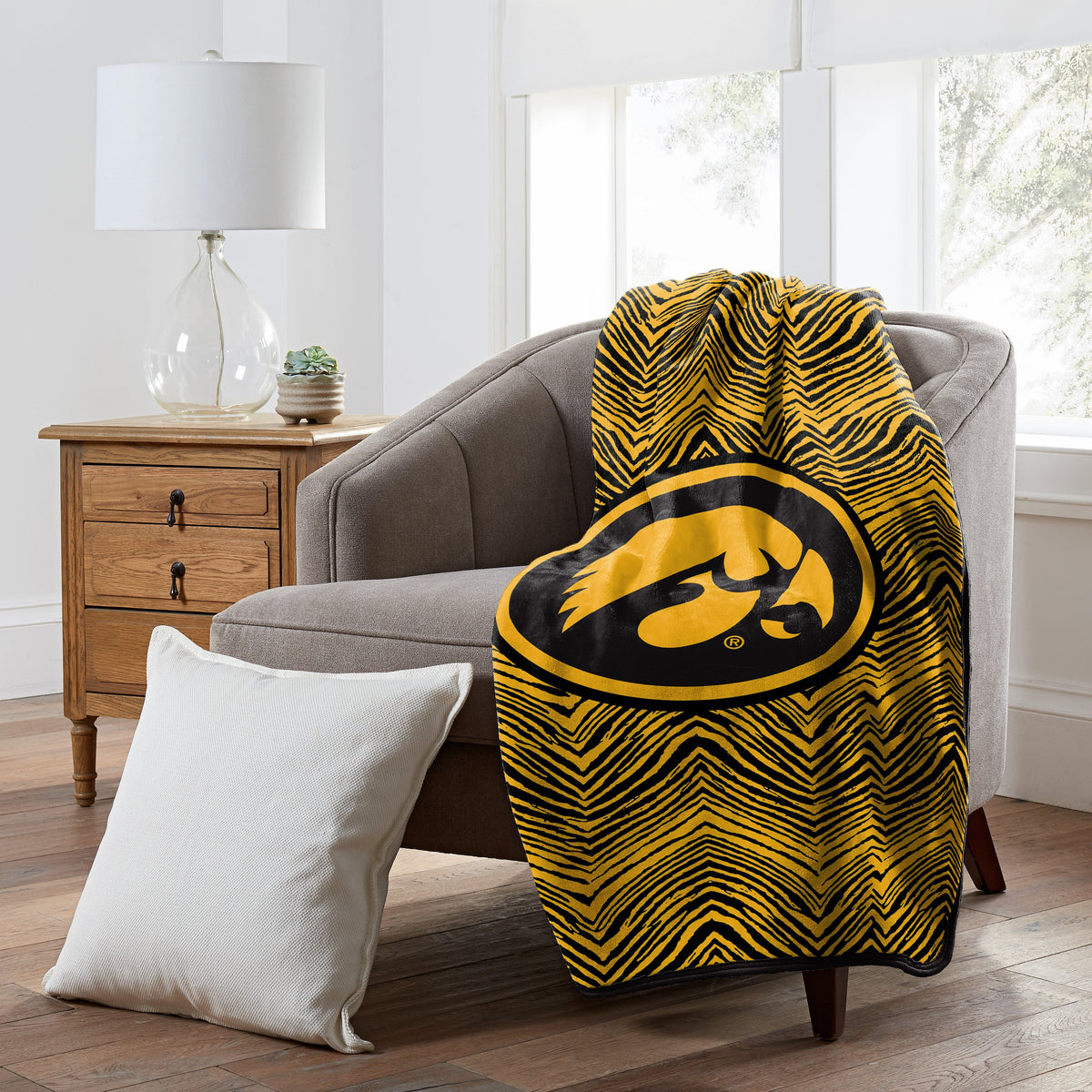 Zubaz x Northwest NCAA Iowa Hawkeyes Zubified Raschel Throw Blanket