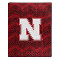 Zubaz x Northwest NCAA Nebraska Cornhuskers Zubified Raschel Throw Blanket