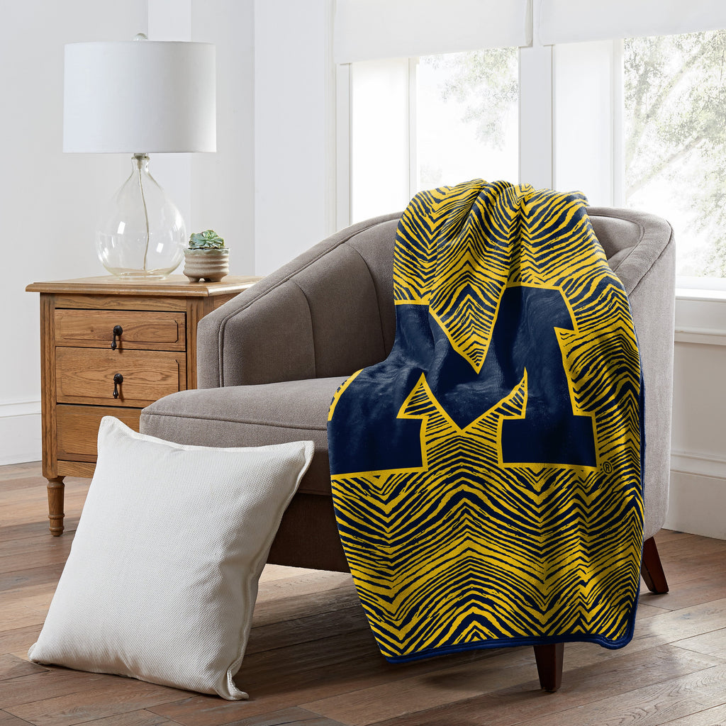 Zubaz x Northwest NCAA Michigan Wolverines Zubified Raschel Throw Blanket